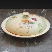 Lot 1059 - Royal Worcester muffin dish.