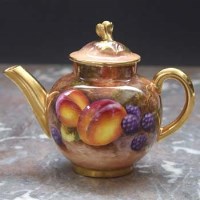 Lot 1065 - Royal Worcester black mark teapot