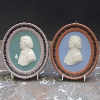 Lot 1068 - Two Wedgwood tri colour plaques.