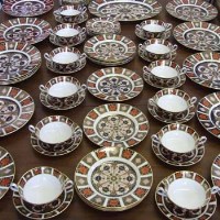 Lot 1074 - Royal Crown Derby dinner service, one oval meat