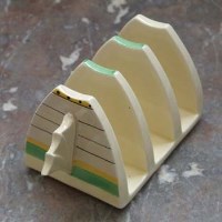 Lot 1092 - Clarice Cliff toast rack.