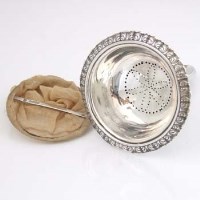 Lot 212 - Silver wine funnel and silver framed sieve.