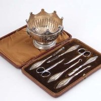 Lot 216 - Silver small rose bowl and a cased manicure set.