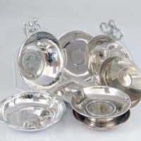 Lot 229 - Six sterling dishes, and seven coin based dishes