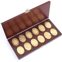 Lot 241 - Cased set of twelve silver gilt medallions