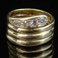 Lot 246 - Gold and diamond snake ring