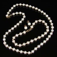 Lot 254 - Cultured pearl choker necklace together with the