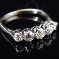 Lot 264 - Five-stone diamond ring in 18ct white gold.