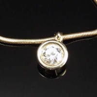 Lot 289 - Diamond pendant on a gold chain