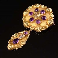 Lot 302 - 18ct gold brooch set with amethyst and citrine
