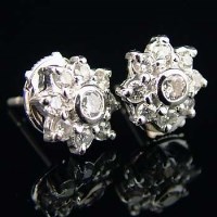 Lot 329 - Pair of diamond cluster earrings in 18ct white