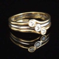 Lot 331 - Three stone diamond ring in 18ct gold
