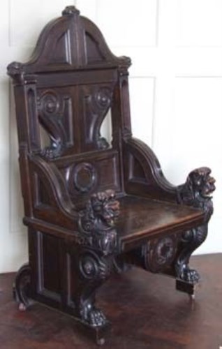 Lot 737 - Oak baronial hall chair