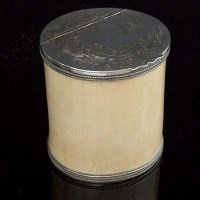 Lot 137 - Ivory tusk biscuit or tea jar with electro-plated