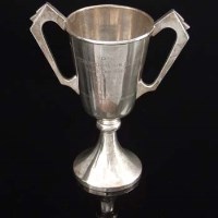 Lot 141 - Silver two handled trophy.