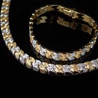 Lot 160 - 18ct white and yellow gold fancy link necklace