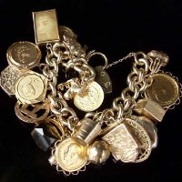 Lot 162 - Gold charm bracelet.