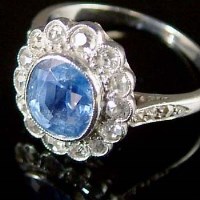 Lot 220 - Sapphire and diamond ring