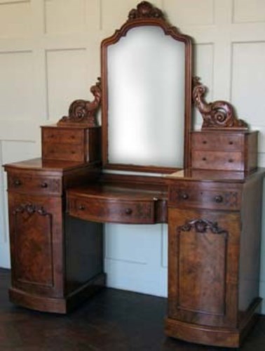 Lot 505 - Walnut dressing table.