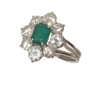 Lot 58 - Emerald and diamond oval cluster 18ct white gold ring