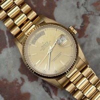 Lot 419 - Rolex gents oyster day - date with papers and a