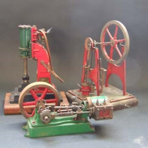 Lot 511 - Stuart hammer engine and two flywheel