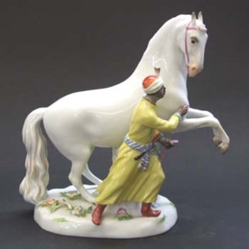 Lot 603 - Meissen blackamoor horse tamers