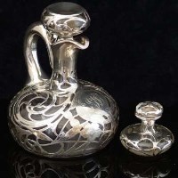 Lot 243 - Silver covered ewer and matching small flask