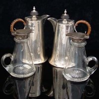 Lot 254 - Two pairs of jugs