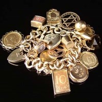 Lot 267 - 9ct gold charm bracelet