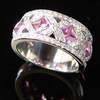 Lot 289 - Pink sapphire and diamond ring