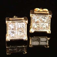 Lot 290 - Princess cut diamond earrings in 18ct yellow gold