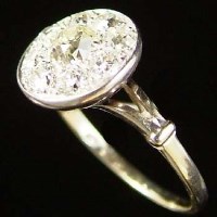 Lot 298 - 18ct gold diamond cluster ring.