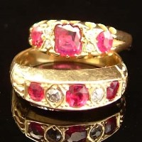 Lot 313 - Two 18ct gold ruby and diamond rings.