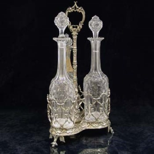 Lot 280 - Victorian electro-plated decanter stand and three