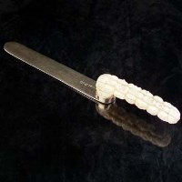 Lot 282 - Silver Japanese paginator with carved ivory(no