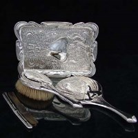 Lot 293 - Art nouveau silver tray, silver hand mirror, hair
