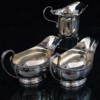 Lot 297 - Pair silver sauce boats and a silver cream