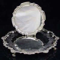 Lot 298 - Engraved silver tray and a silver waiter (3)
