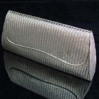 Lot 316 - 18ct white gold evening purse, 278.4g