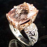 Lot 317 - Morganite and diamond 14k white gold ring