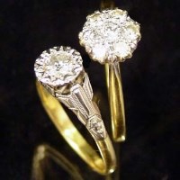 Lot 323 - 18ct and platinum diamond cluster ring and an