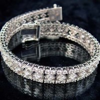 Lot 341 - White gold and diamond bracelet