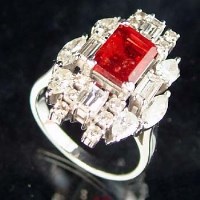Lot 357 - Platinum cluster ring set emerald-cut red spinel