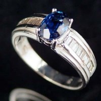 Lot 367 - Sapphire and diamond ring, sapphire approx 1.10ct