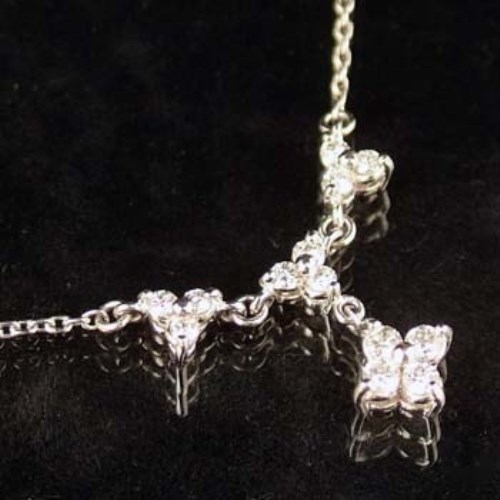 Lot 413 - Diamond floret platinum necklace