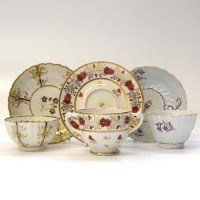 Lot 532 - Barr teabowl and saucer, Caughley teabowl and saucer and a Coalport chocolate cup and saucer.