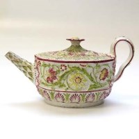 Lot 562 - Moulded pearl ware tea pot