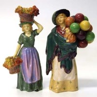 Lot 594 - Royal Doulton figure of the Balloon Seller HN583 and one other of Covent Garden HN1329