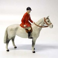 Lot 606 - Beswick huntsman on grey horse.